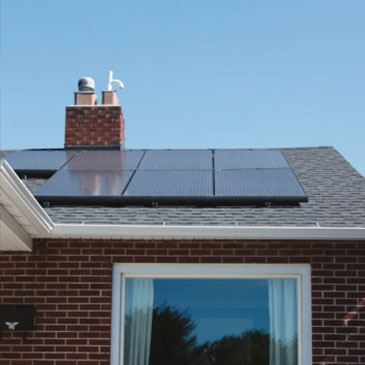 10.3 kW residential package solar panels on a roof