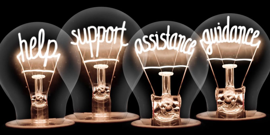 light bulbs with the words help, support, assistance and guidance, inside them