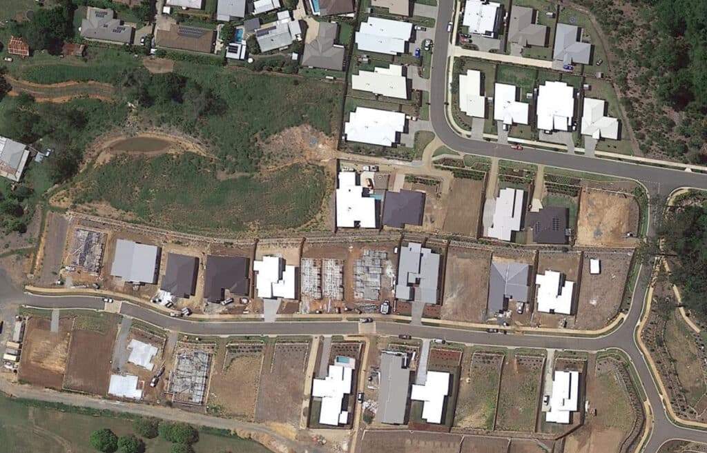 Aerial view of a development site with new homes ready for solar panels to be installed